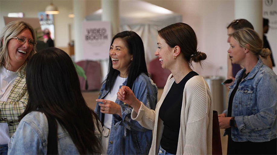 women at a conference