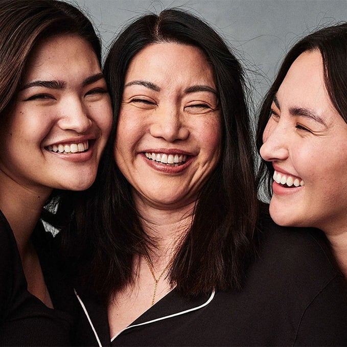 three women smiling