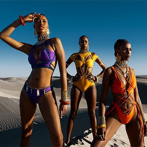 three women in desert landscape